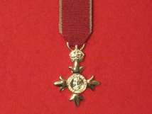 MINIATURE MEMBER OF THE BRITISH EMPIRE MBE MEDAL WITH CIVILIAN RIBBON