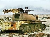 Iraqi Tank waiting for paint touchup !.