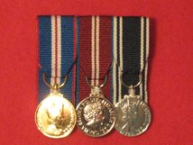 MINIATURE COURT MOUNTED GOLDEN JUBILEE DIAMOND JUBILEE AMBULANCE MEDAL TRIO.