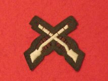 NUMBER 2 DRESS FAD CROSSED RIFLES BADGE