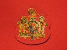 MESS DRESS WO1 RSM BSM GOLD ON RED BADGE