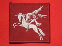 AIRBORNE DIVISION BADGE PEGASUS FORMATION DROP ZONE DZ BADGE LIGHT BLUE ON MAROON LEFT FACING