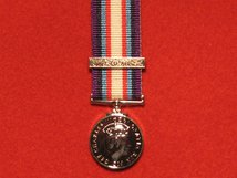 MINIATURE HUMANITARIAN SERVICE MEDAL CIIIR WITH LIBYA CLASP CHARLES III